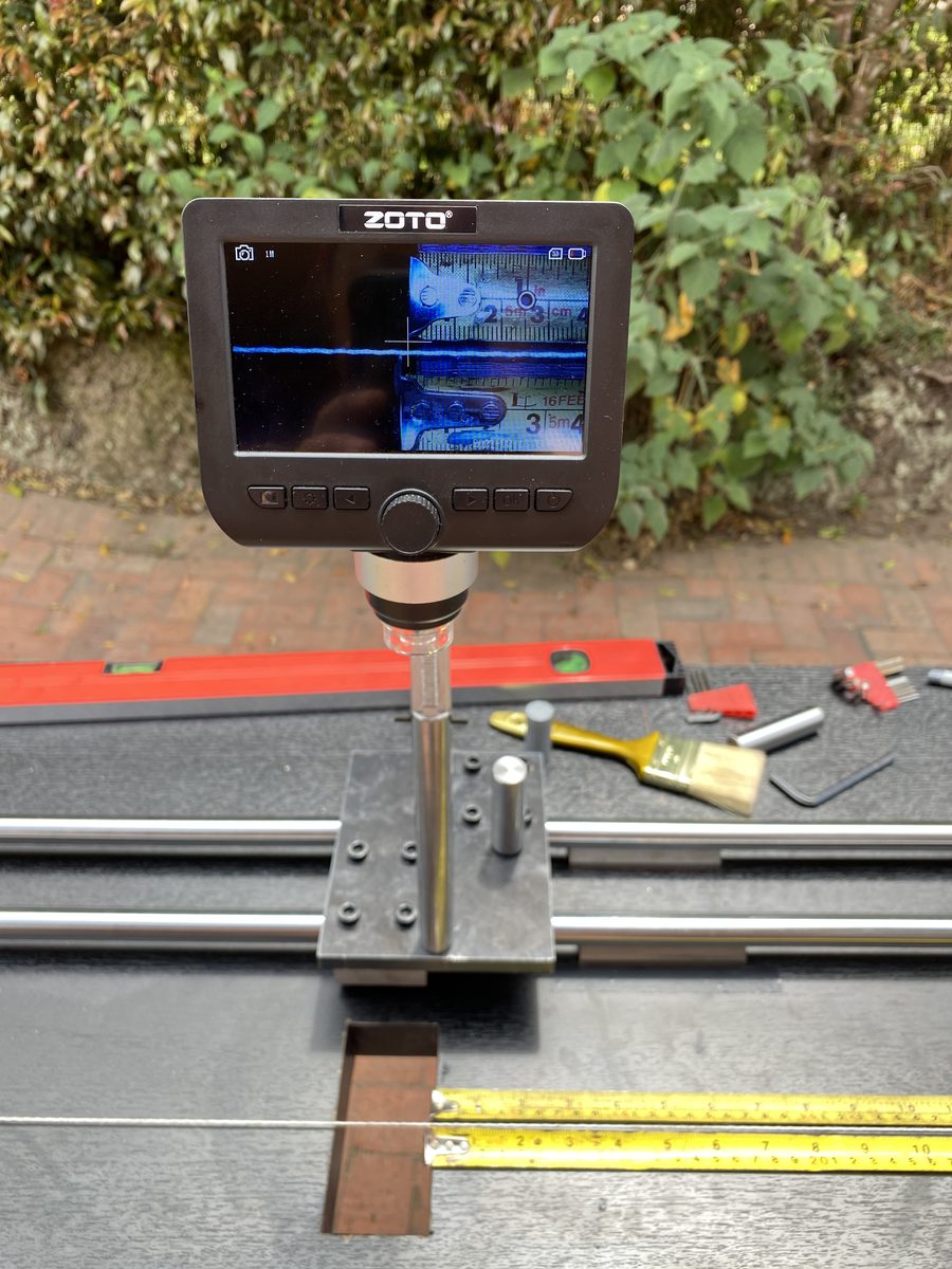 Equipo de calibración de cintas métricas con microscopio digital